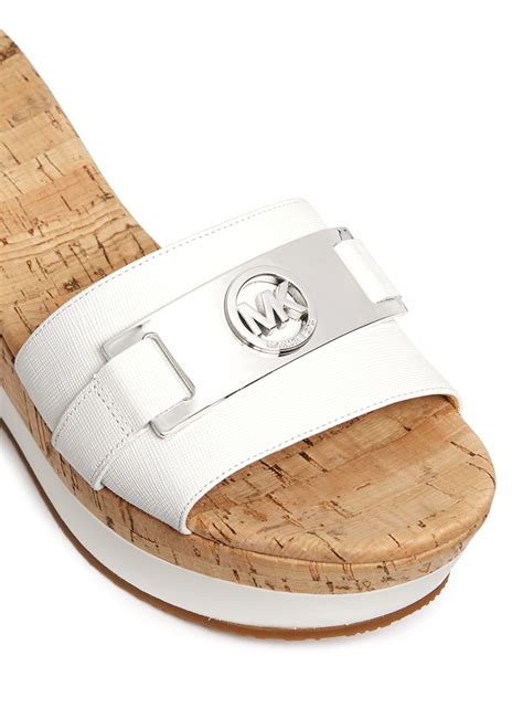 michael michael kors warren platform wedge white sandal canada|Michael Kors Outlet.